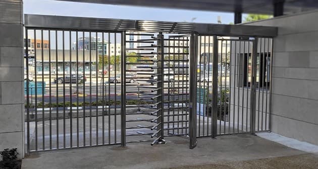 Turnstile lanes being installed on a prepared lobby floor