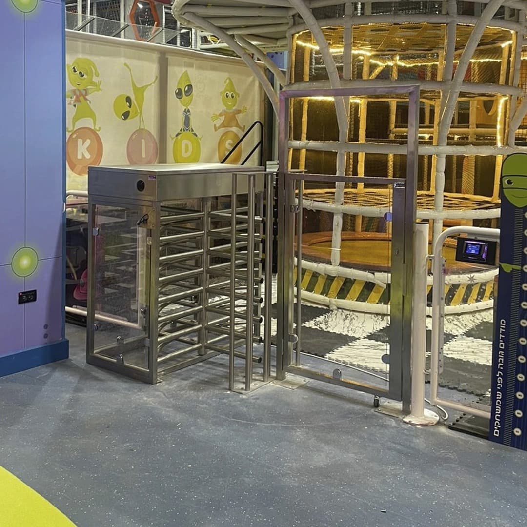 Gatestile Three-Quarter Turnstile in a transit mezzanine setting, deployment visualization