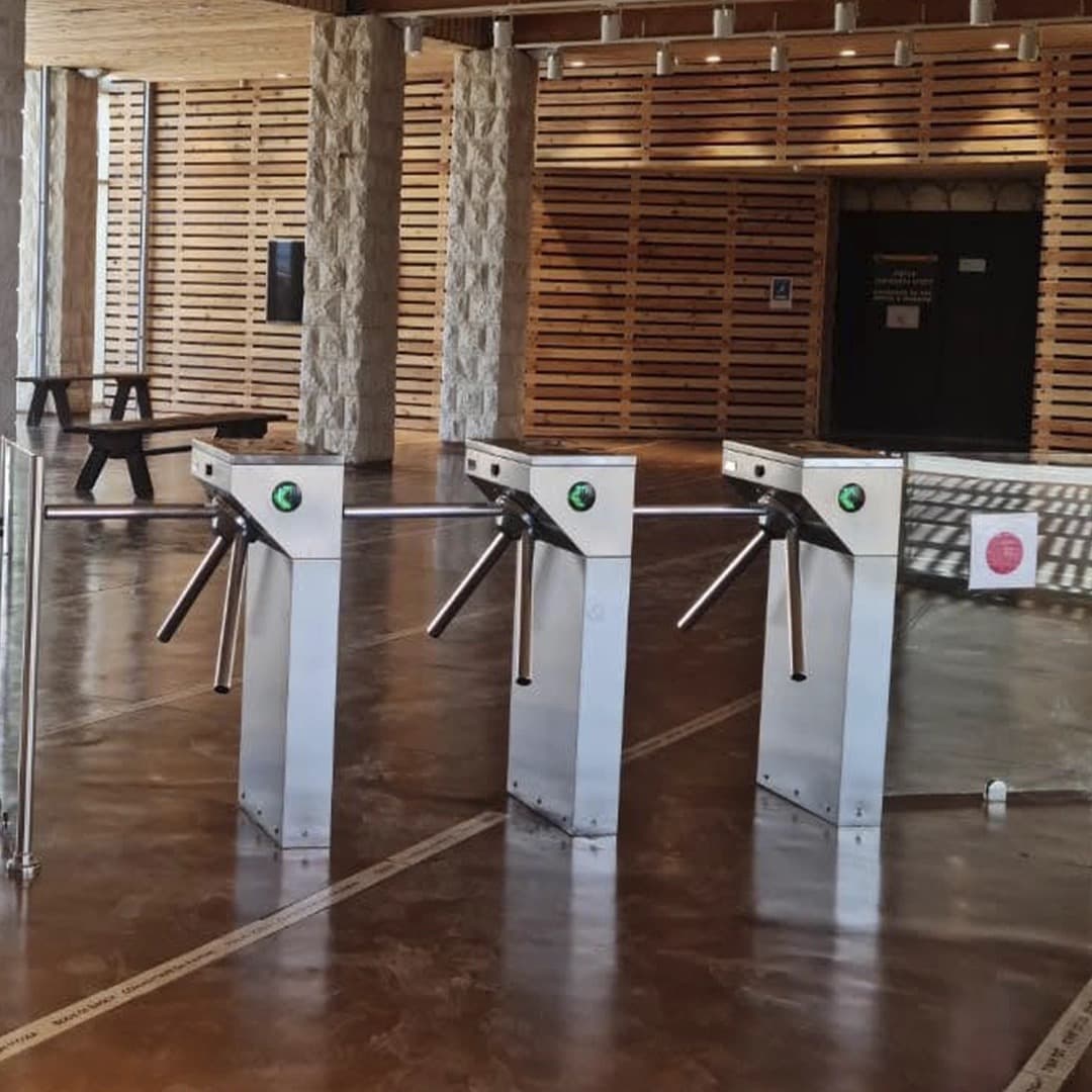 Gatestile Tripod Turnstile in a corporate cafeteria setting, deployment visualization